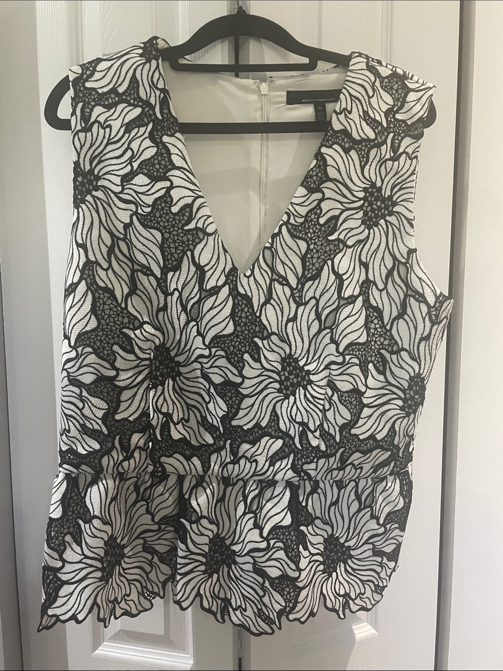 Black and White Sleeveless Peplum Embroidered Top